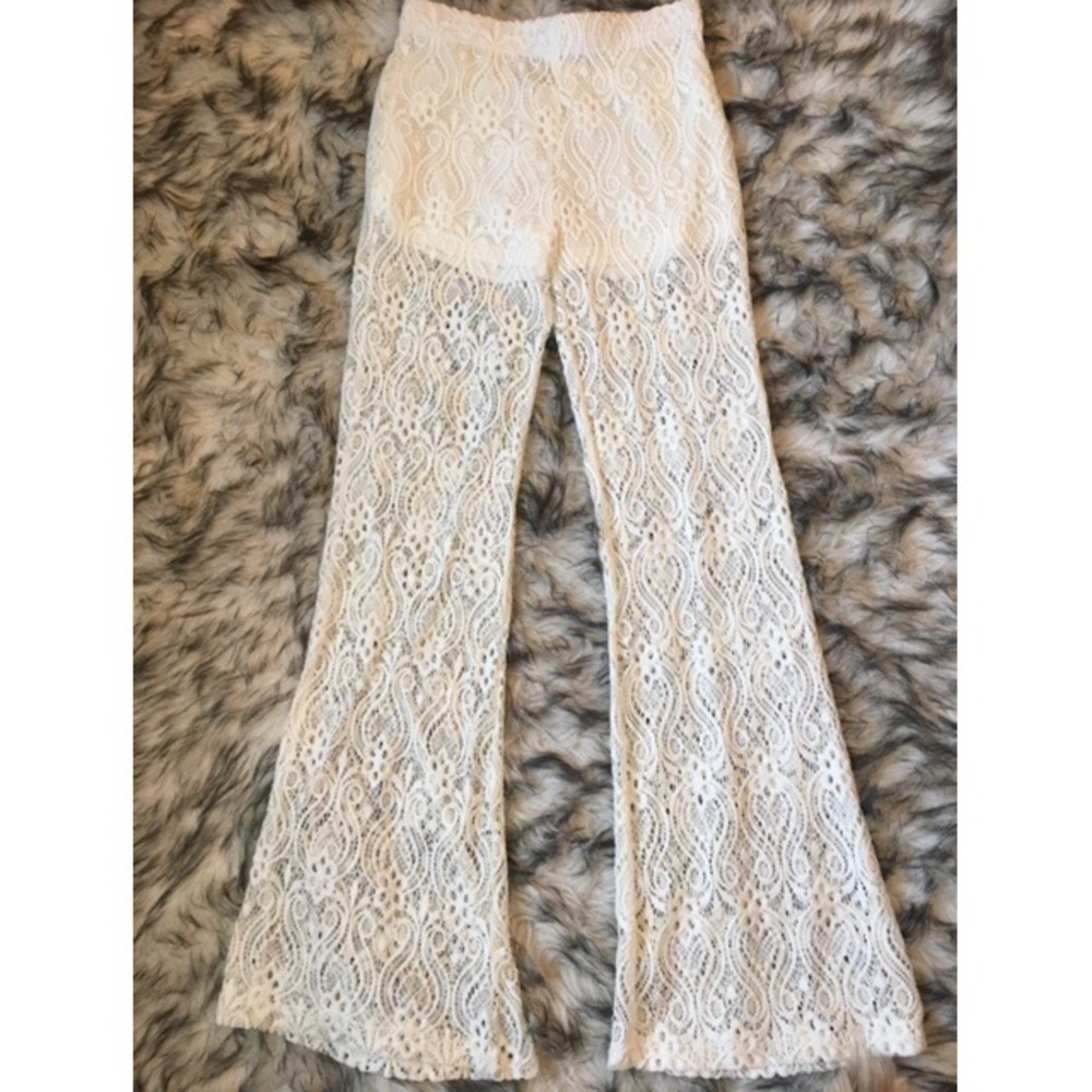• Beachy see-through pants. • Never worn